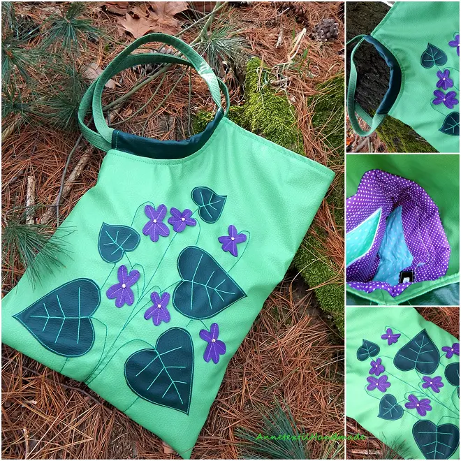 Aszimmetrikus női kézműves válltáska ibolyákkal